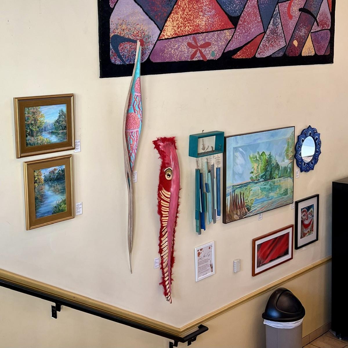 Nine colorful pieces of artwork