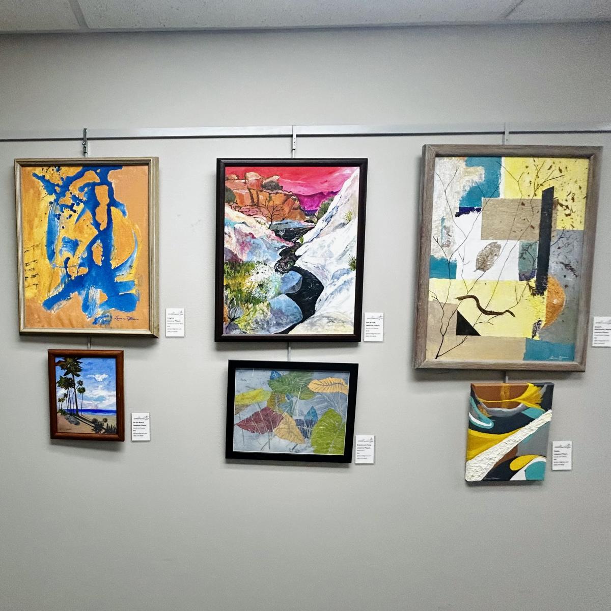 two rows of colorful pieces of artwork