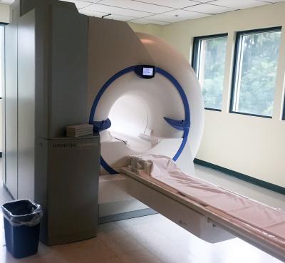 New TIM MRI Annnounced for SIMED. Photo of the TIM MRI with shorter tunnel and windows surrounding it.