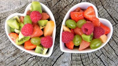 Two Heart Shaped Bowls of Healthy Fruit